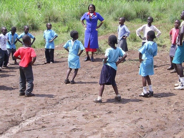 School children doing outdoor exercise